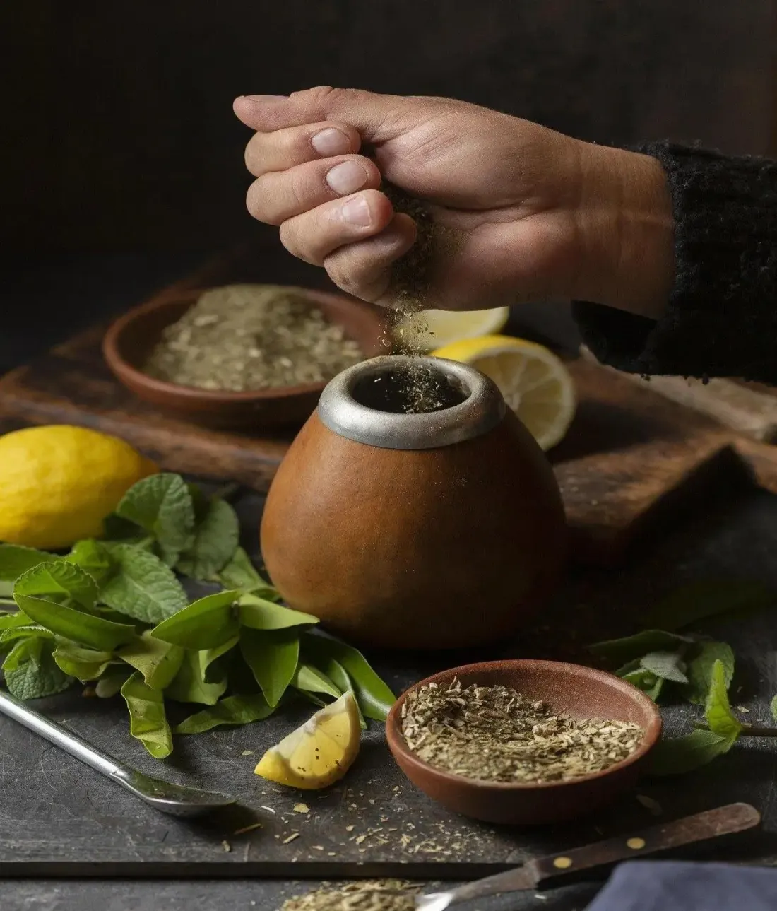 Ayurvedic herbs being prepared by hand at Roshni Botanicals